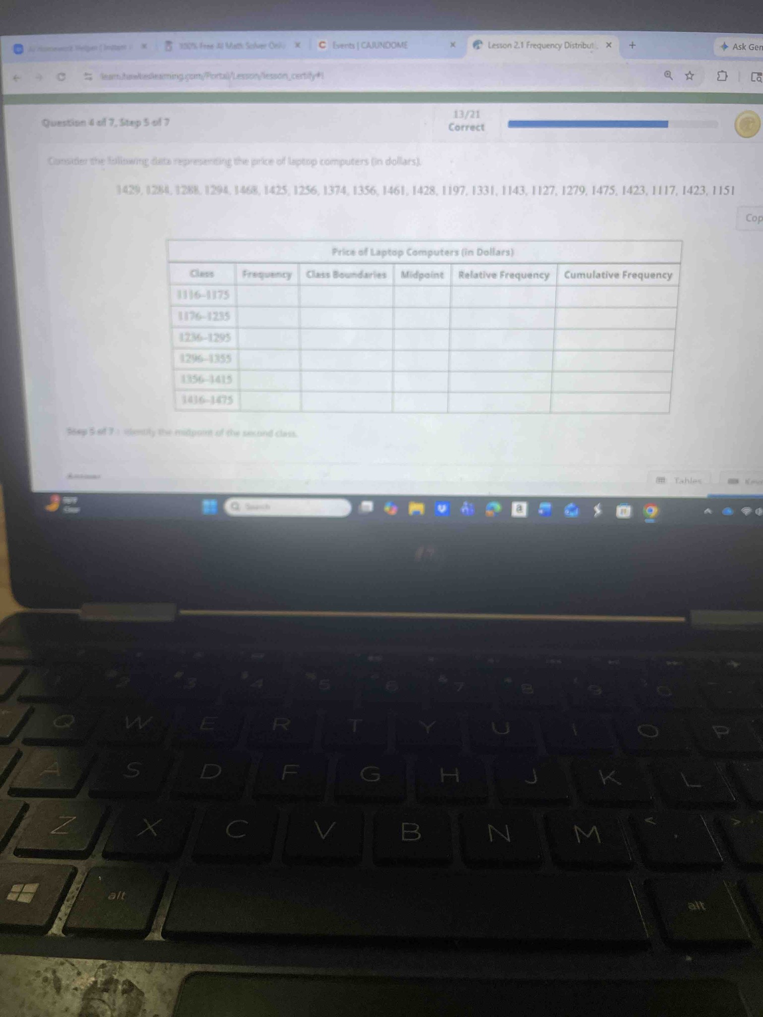 Step 5 of 7: Identify the midpoint of the second class for the price of laptop computers (in Dollars).