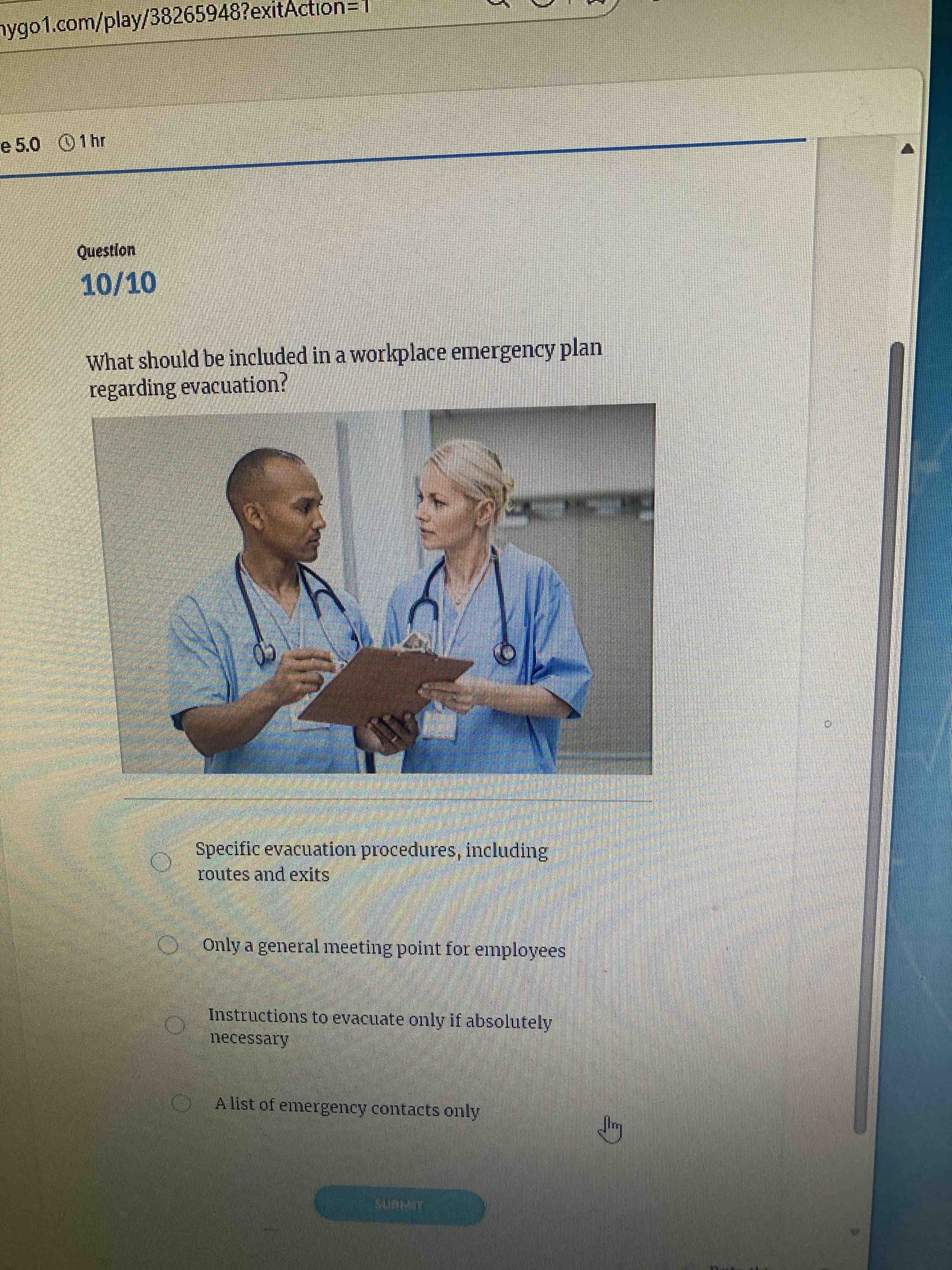 What should be included in a workplace emergency plan regarding evacuation?
