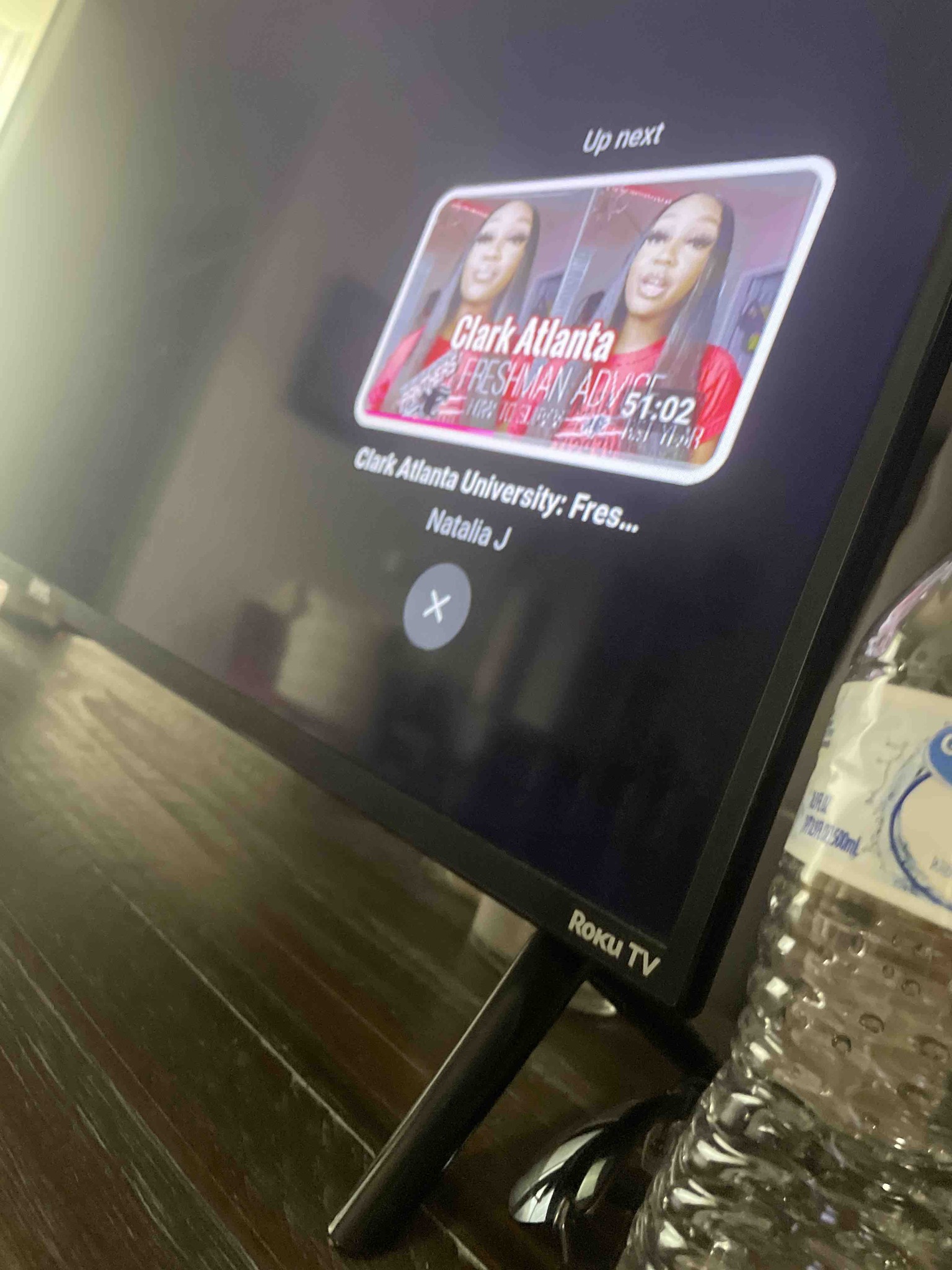 What is the content shown on the television screen in the image?